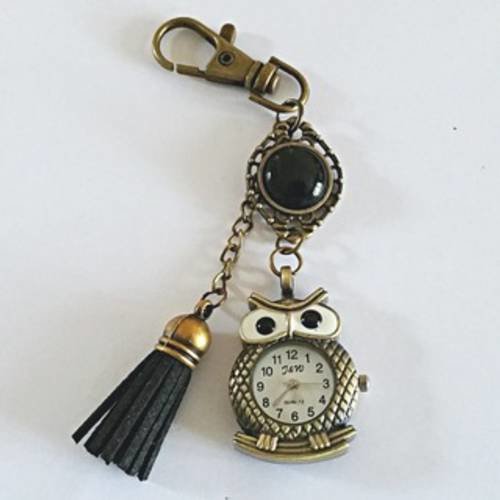 Bijou de sac/porte clés "montre chouette" bronze et noir,  chouette bronze, cabochon onyx et pompon noirs