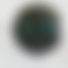 Bague ronde cabochon chat noir - yeux turquoise sur monture en métal argenté 