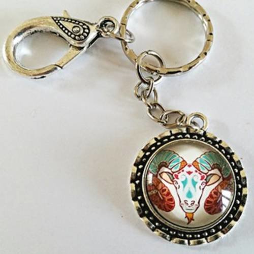 Bijou de sac/porte clés signe du zodiaque "bélier" avec cabochon en verre, mousqueton ciselé et anneau 