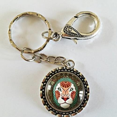 Bijou de sac/porte clés signe du zodiaque "lion" avec cabochon en verre, mousqueton ciselé et anneau 