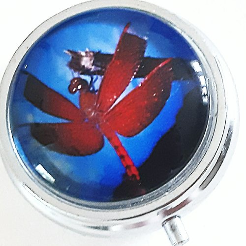 Boîte à pilules, pilulier avec cabochon en verre libellule rouge brique sur fond bleu