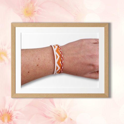 Bracelet liberty tissu, suédine, coton, aux motifs zigzag ,couleur orange et blanc