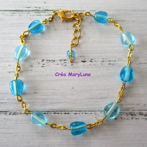 Bracelet en perles de verre en forme de gouttes bleue et chainettes dorées  - + ou - 18 cm réglable - 2182910