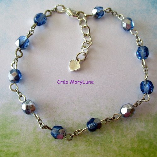 Bracelet en perles de verre transparent ovale à facettes de couleur bleue et chainettes argentés - 2253438