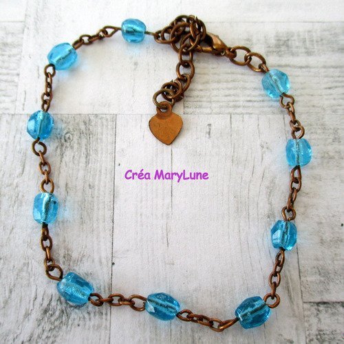 Bracelet en perles de verre transparent de couleur bleue et chainette cuivre - 18 cm réglable - 2276994