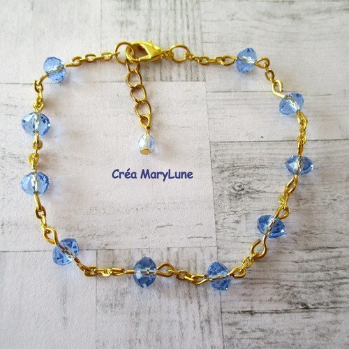 Bracelet en perles de verre à facettes de couleur bleu et chainettes dorées- 18 cm -  2376816