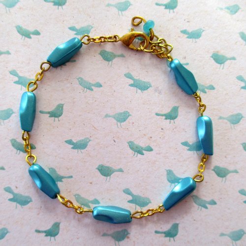 Bracelet en perles géométrique en plastique bleu turquoise