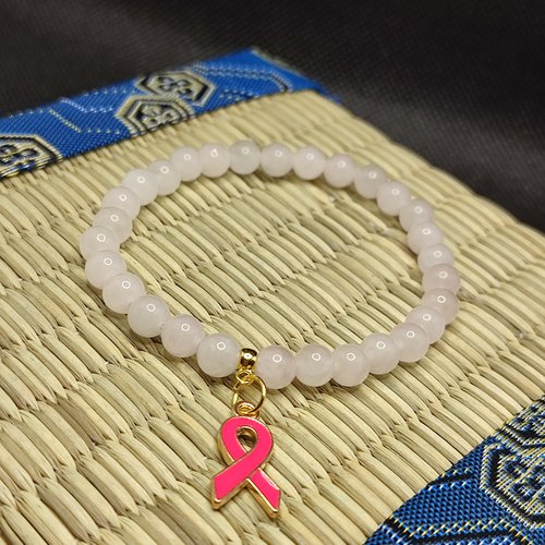 Bracelet octobre rose, bracelet quartz rose, modèle sans insert, perles 6 millimètres, logo foncé
