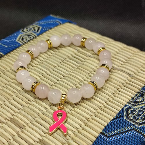 Bracelet octobre rose, bracelet quartz rose, modèle avec insert, perles 8 millimètres, logo foncé