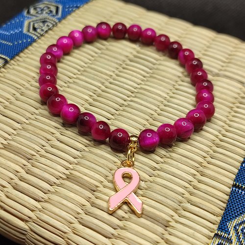 Bracelet octobre rose, bracelet oeil de tigre rose, modèle sans inserts, perles 6 millimètres qualité aaaaa, logo clair