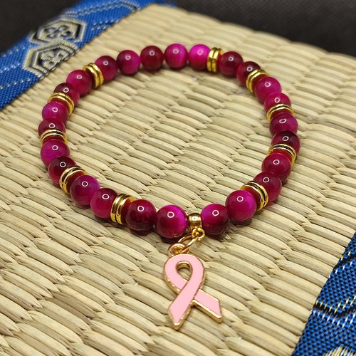 Bracelet octobre rose, bracelet oeil de tigre rose, modèle avec inserts, perles 6 millimètres qualité aaaaa, logo clair