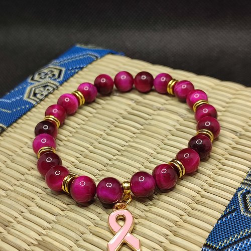 Bracelet octobre rose, bracelet oeil de tigre rose, modèle avec inserts, perles 8 millimètres qualité aaaaa, logo clair