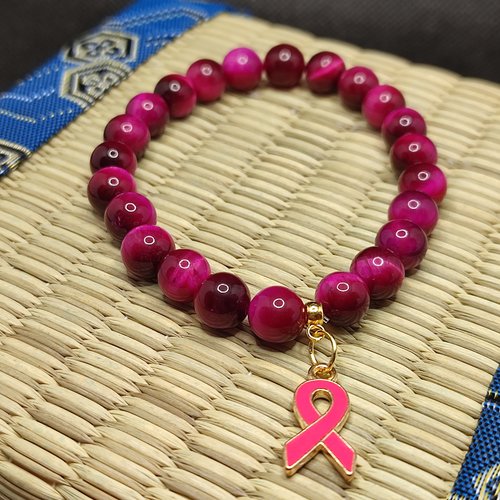 Bracelet octobre rose, bracelet oeil de tigre rose, modèle sans inserts, perles 8 millimètres qualité aaaaa, logo foncé