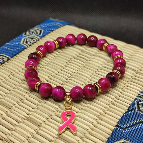 Bracelet octobre rose, bracelet oeil de tigre rose, modèle avec inserts, perles 8 millimètres qualité aaaaa, logo foncé