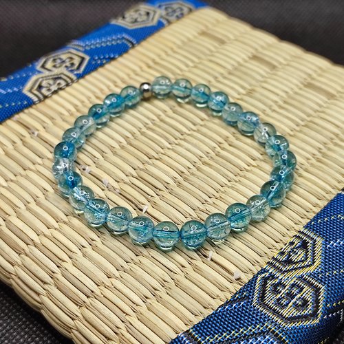 Bracelet topaze bleue, perles 6 mm