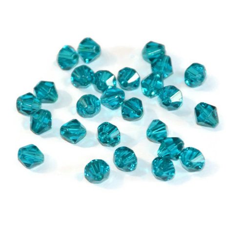 20 perles toupies en verre bleu 6mm