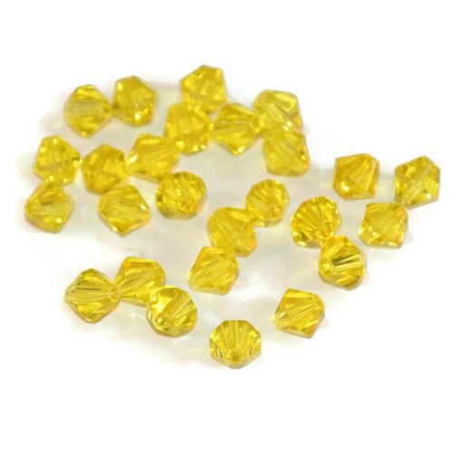 20 perles toupies en verre jaune 6mm