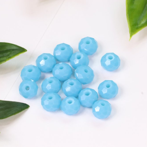 Lot de 15 perles en verre à facettes bleu
