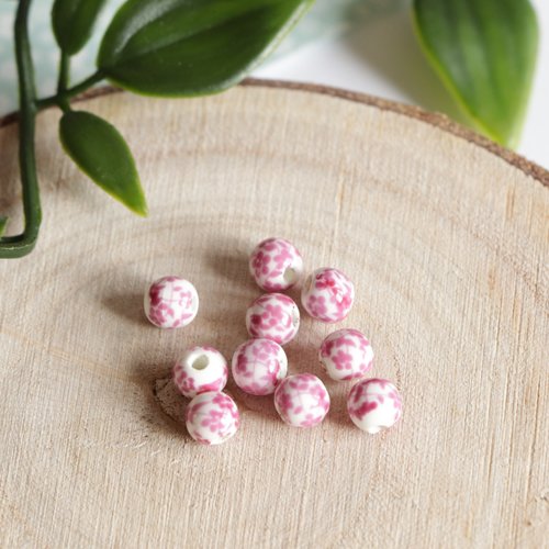 Lot de 10 perles en céramique à fleurs roses