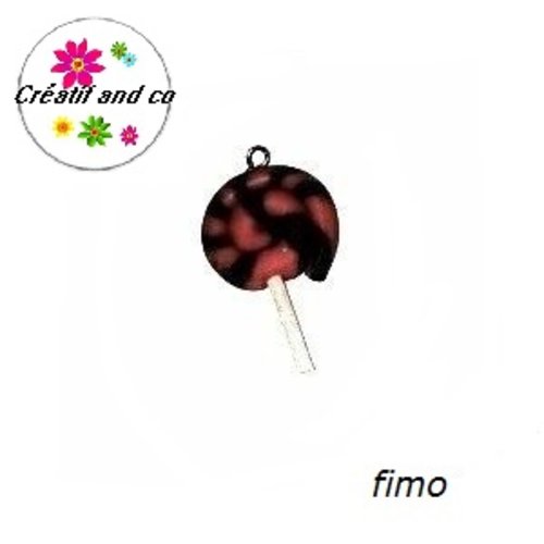 Sucette fuschia/noire en fimo