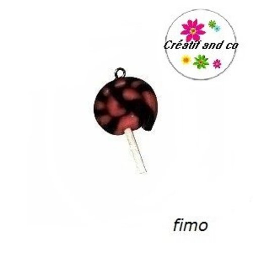 Sucette fuschia/noire en fimo