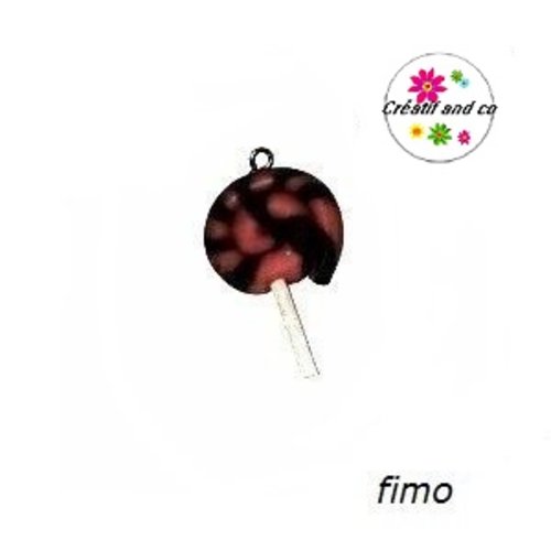 Sucette fuschia/noire en fimo