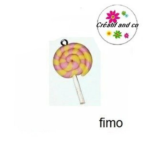 Sucette rose/jaune en fimo