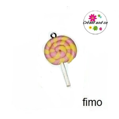 Sucette rose/jaune en fimo