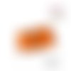 Breloque bonbon anglais orange/noir en fimo