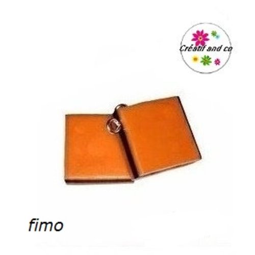 Breloque bonbon anglais orange/noir en fimo