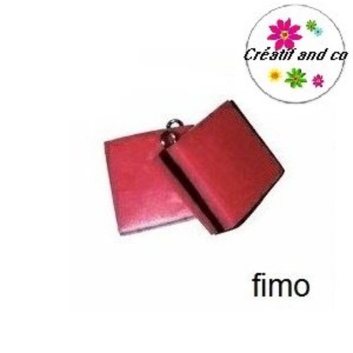 Breloque bonbon anglais fuchsia/noir en fimo