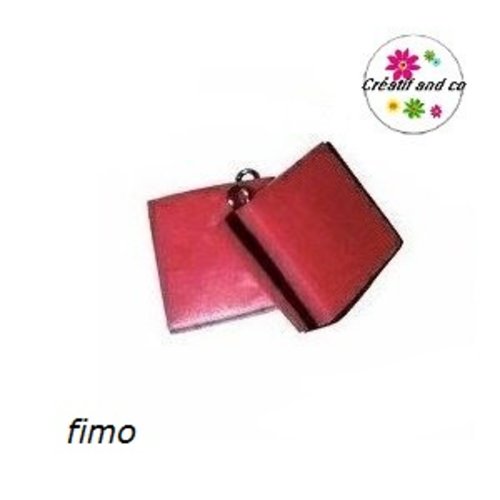 Breloque bonbon anglais fuchsia/noir en fimo