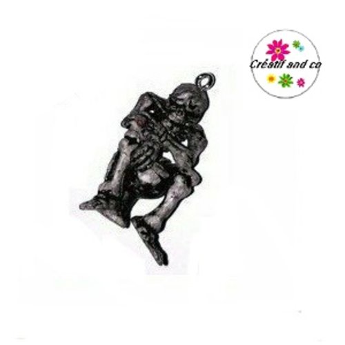 Breloque squelette assis sur wc 34mm