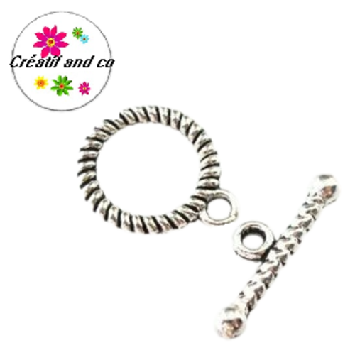 Fermoir toggle rond torsadé métal argenté 22mm