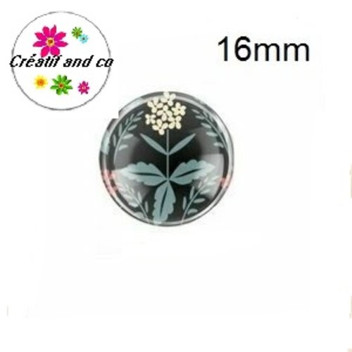 Cabochon fleur grise/bleu fond noir 16mm