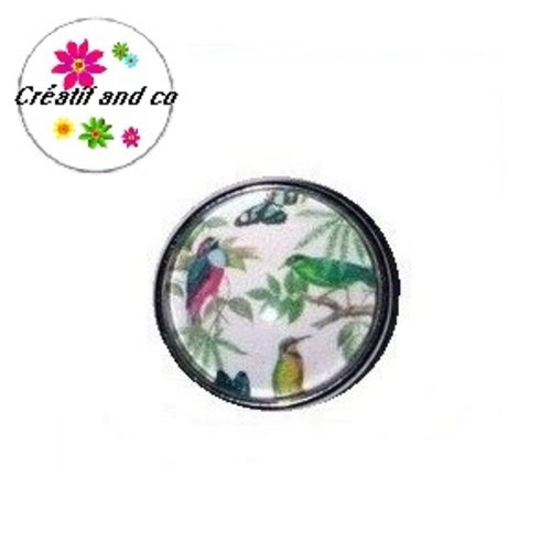 Bouton pression feuilles tropicales et oiseaux