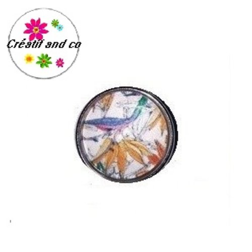 Bouton pression feuilles tropicales et oiseaux