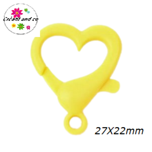 Mousqueton forme coeur jaune foncé plastique 27x22mm