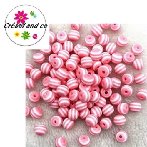 X10 perles rondes résine rayées roses/blanches 6mm