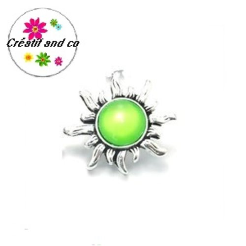 Bouton pression soleil métal cabochon vert résine