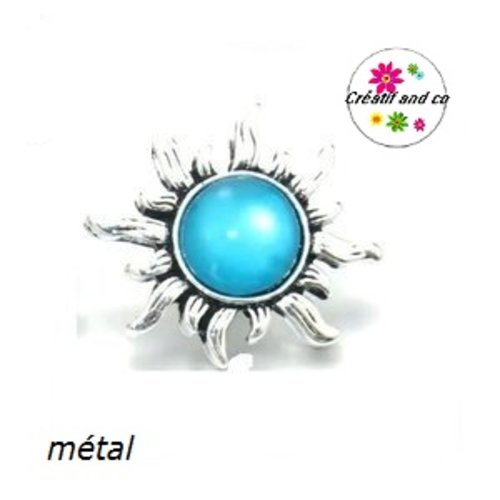 Bouton pression soleil métal cabochon bleu résine