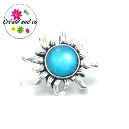 Bouton pression soleil métal cabochon bleu résine