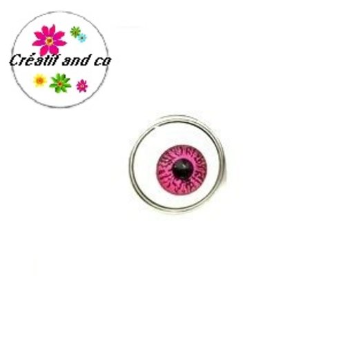 Bouton pression oeil iris couleur fuchsia résine