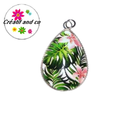 Pendentif et son cabochon fleurs et feuilles tropicales 18x25mm