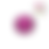 Bouton pression fuchsia à pois noir