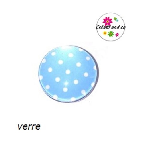 Bouton pression bleu clair à pois blanc