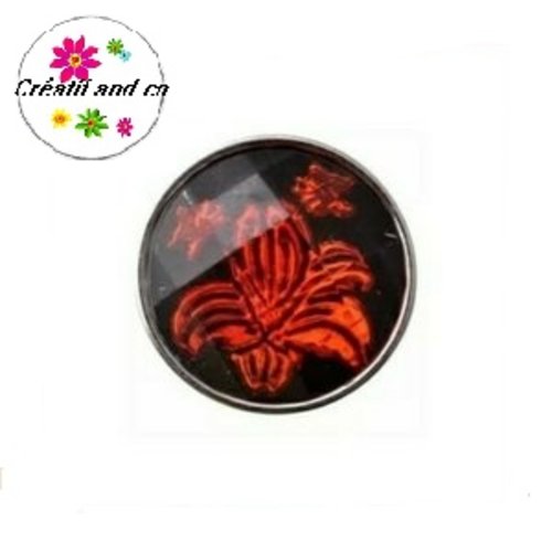 Bouton pression fond noir motif rouge résine