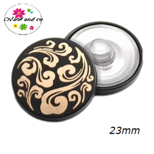 Bouton pression noir et or métal 23mm
