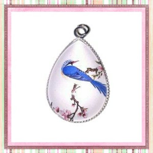 Pendentif et son cabochon goutte oiseau bleu 18x25mm