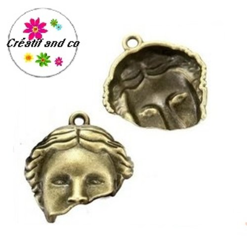 Pendentif visage demi-personne bronze 20mm